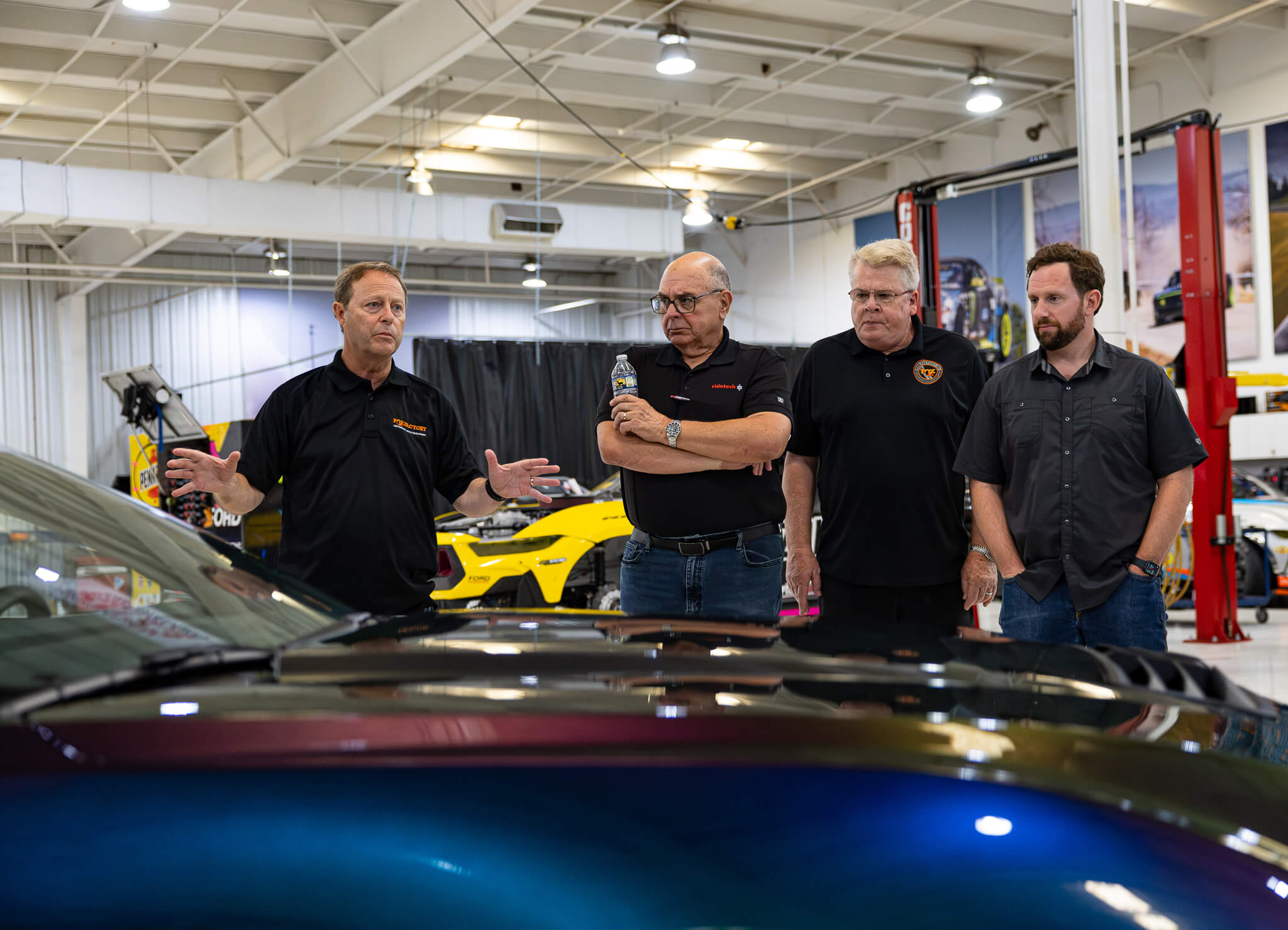 Fox Factory members take a tour of the RTR Lab