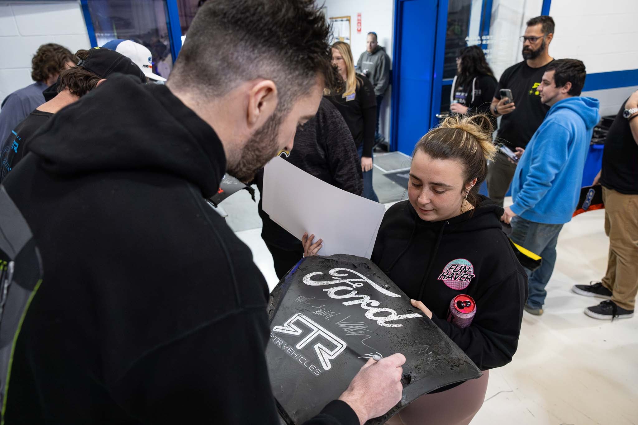 James Deane signs a crash part from the 2023 Formula Drift season