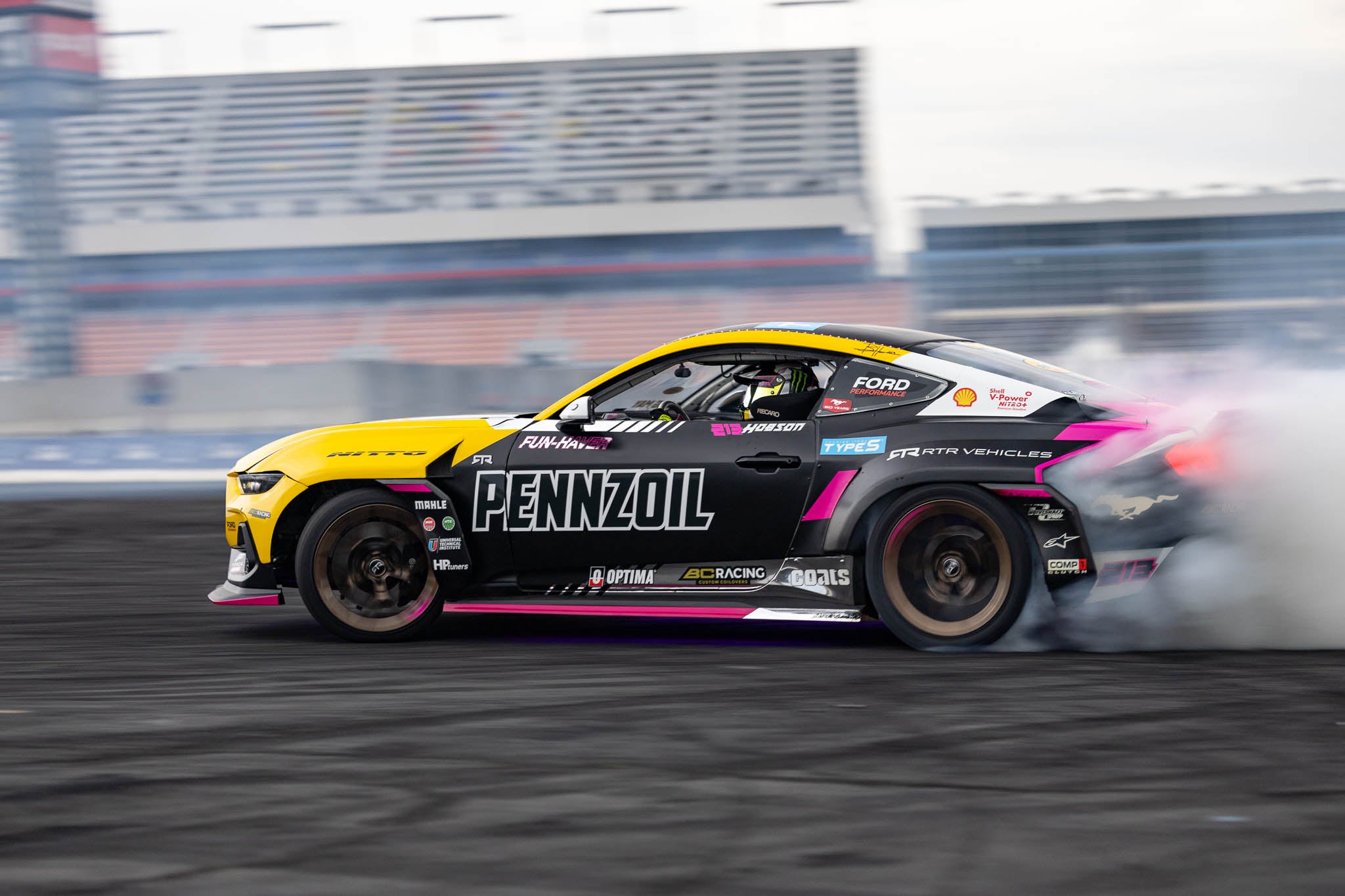 Ben Hobson drifts his 2024 Mustang RTR Spec 5-D on course at Charlotte Motor Speedway