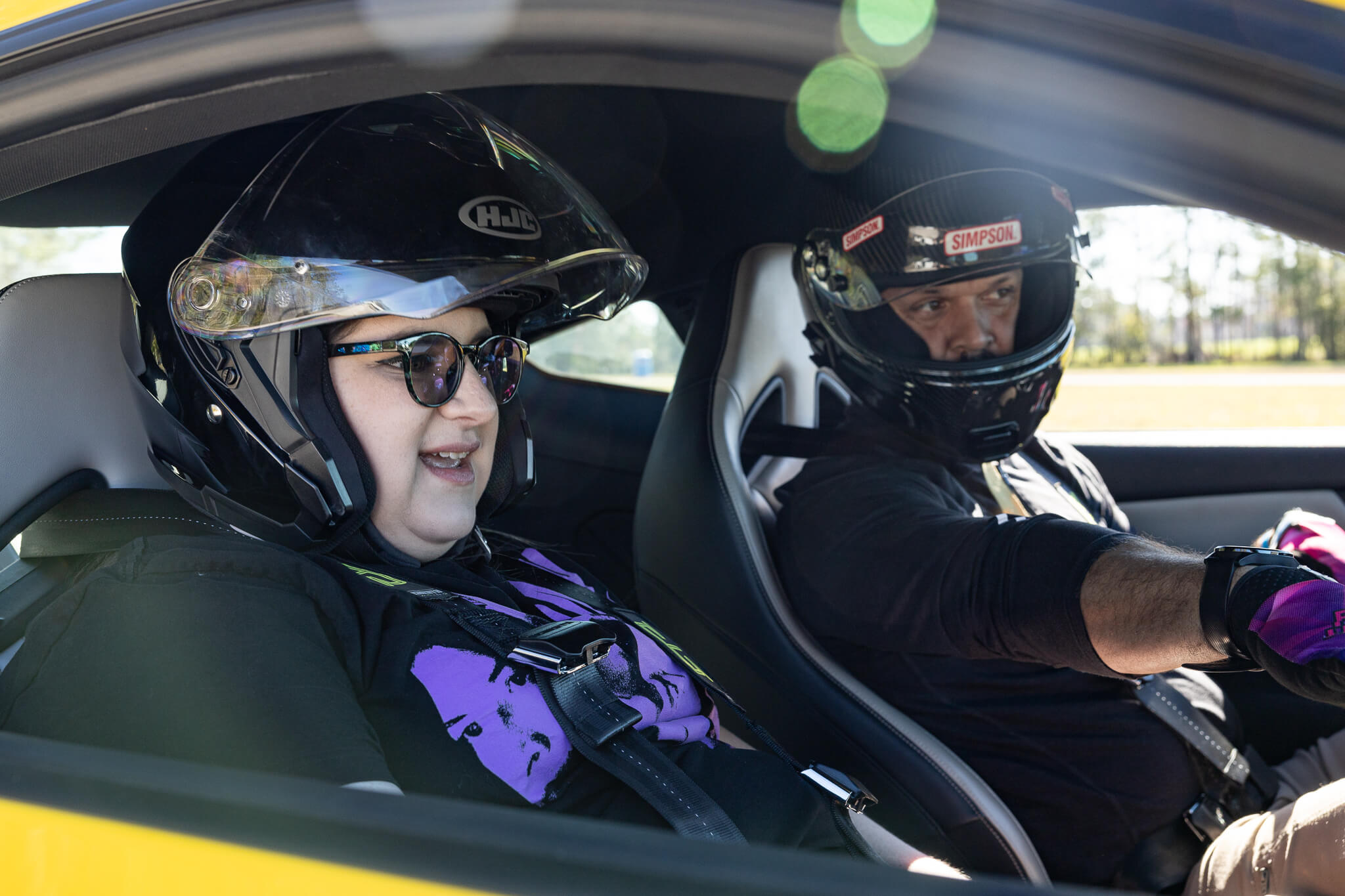 A ridealong passenger learns about the features of the 2024 Mustang RTR Spec 2