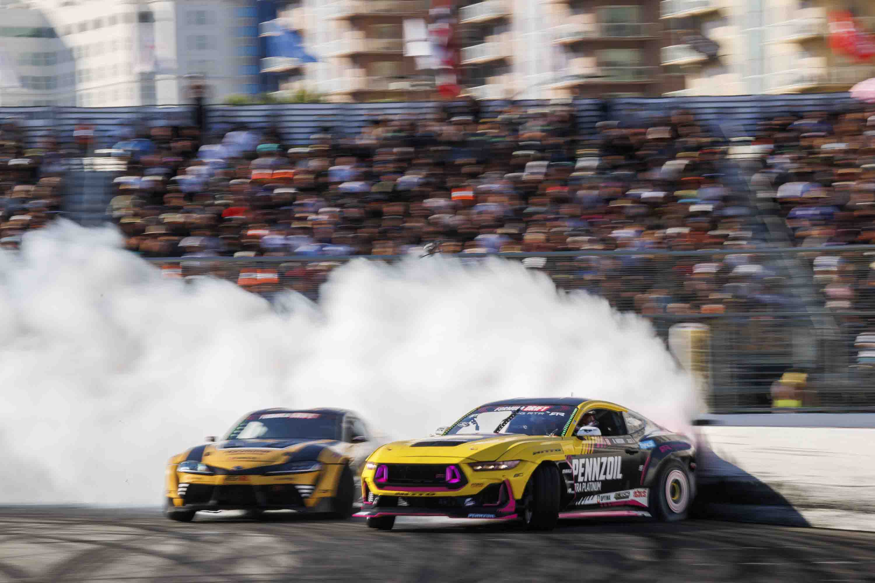 Ben Hobson in his Mustang RTR Spec 5-FD, battles with Fredric Aasbo in the Top 16 at the 2025 Round 8 Formula Drift in Long Beach California
