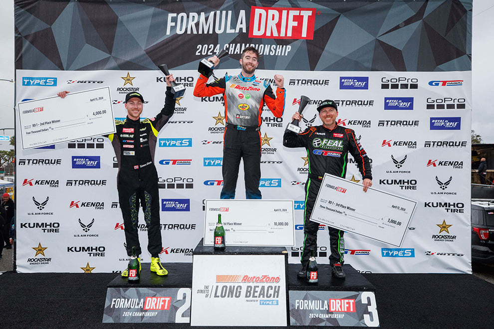 James Deane on podium after winning at FD Long Beach 2024