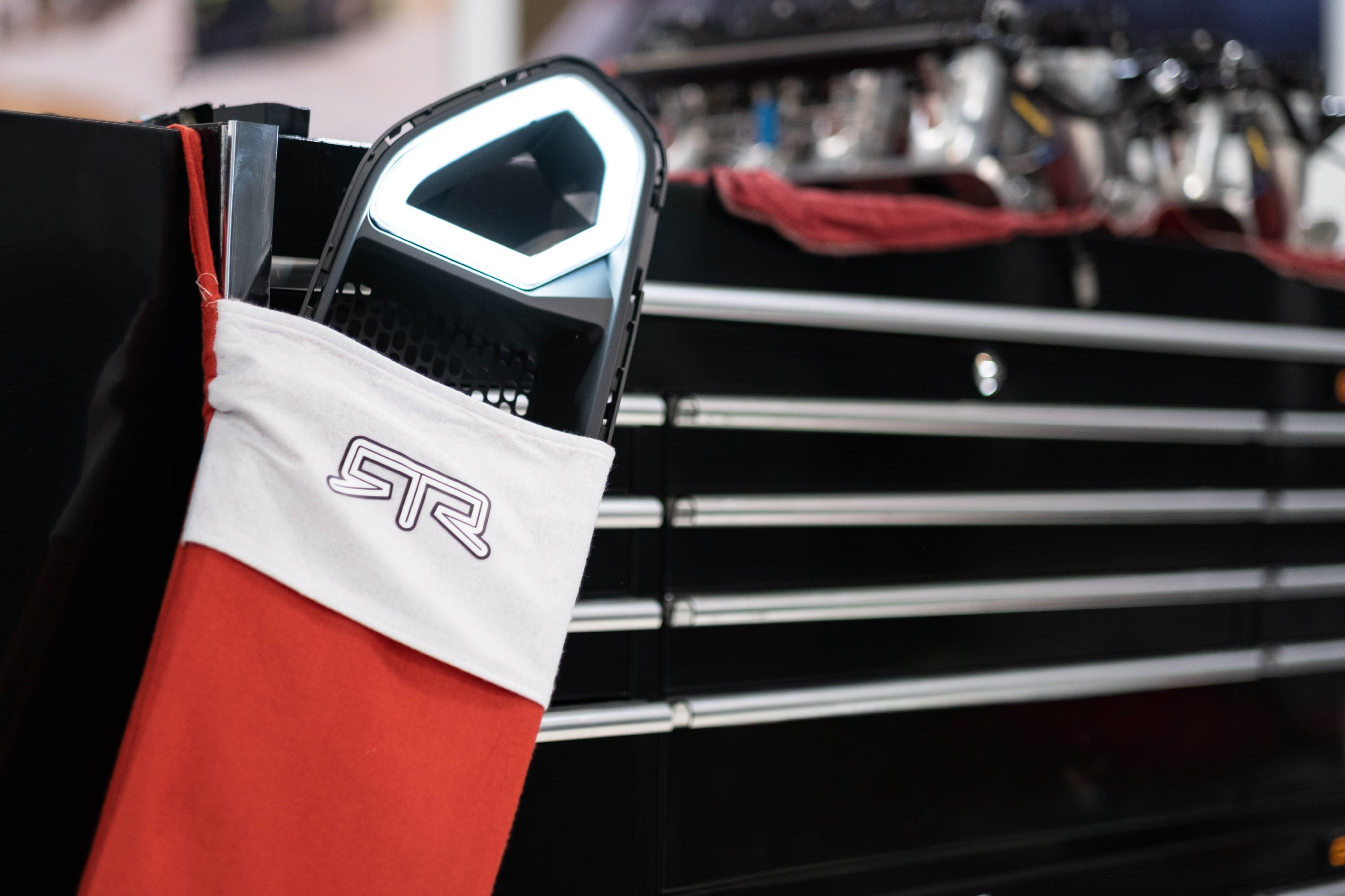 Red and White stocking with a lit RTR Mustang Grille inside of it