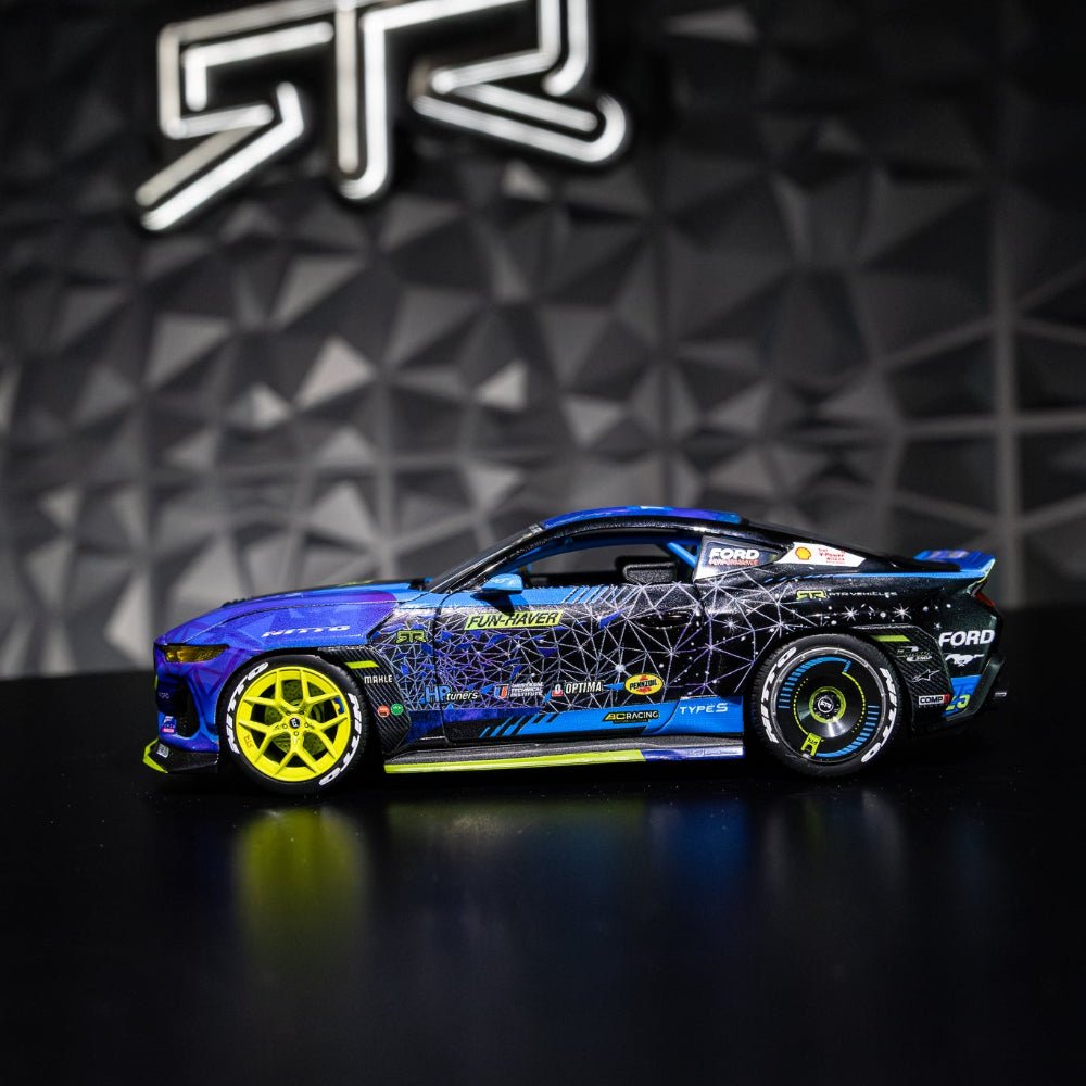 Vaughn Gittin Jr's 2024 Ford Mustang RTR Spec 5-FD Diecast Model with detailed design, rubber tires, and functional components, ideal for collectors.