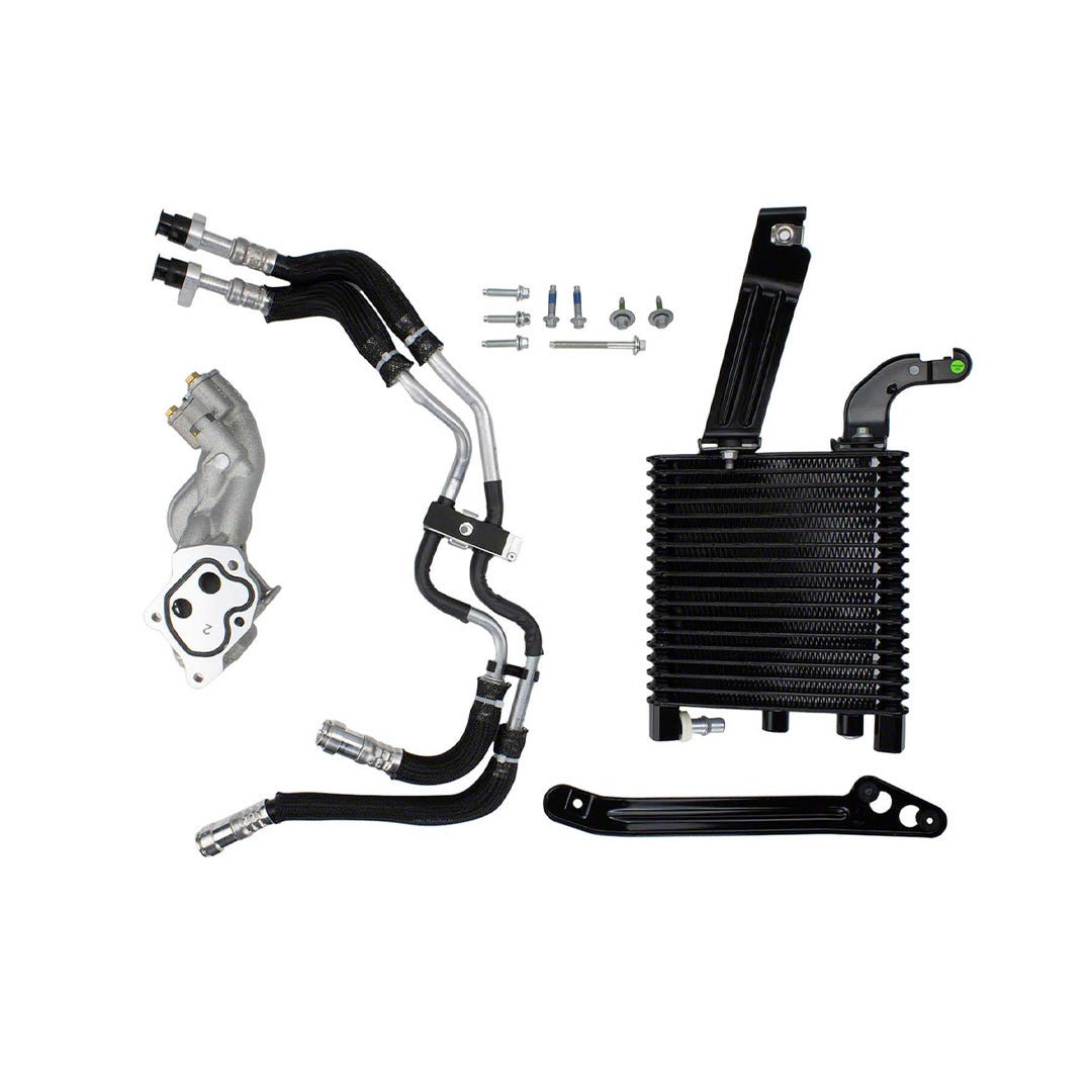 Automotive oil cooler and related components on a white background