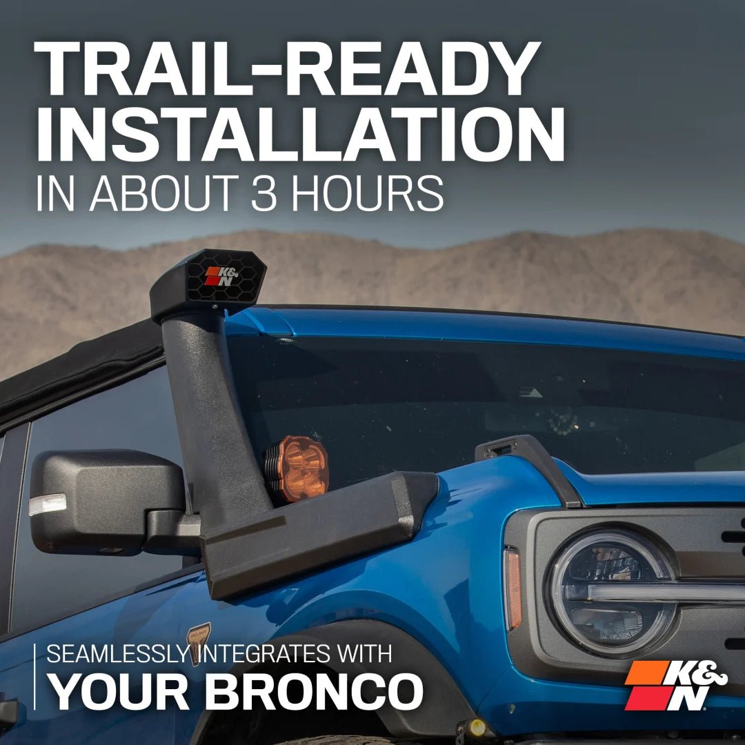 Blue Bronco with off-road light bar and desert background, K&N logo visible
