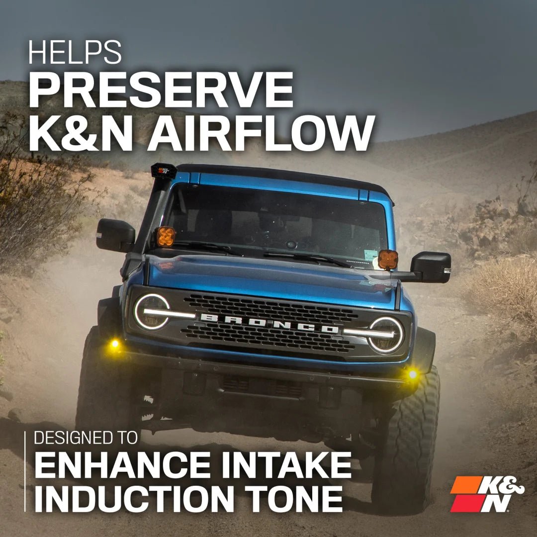 Ford Bronco on a dirt road with promotional text about K&N Airflow preservation and enhancement.