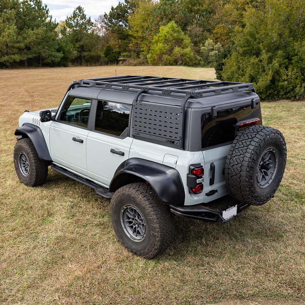 RTR Roof Rack & Light Bar for 21+ Bronco, 22+ Bronco Raptor: Off-road ready steel rack with aluminum crossbars, gusseted light bar, and Molle accessory panels for adventure gear.