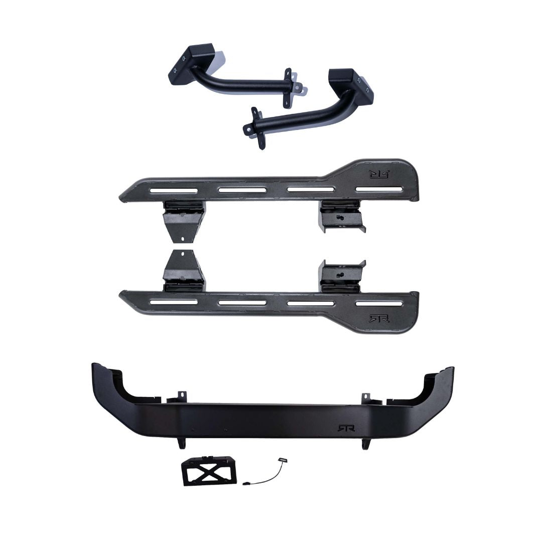 Components of RTR Trail Protection Bundle (21+ Bronco): two steel step rails, two end-caps, four mounting brackets, and an accessory plate for installation.