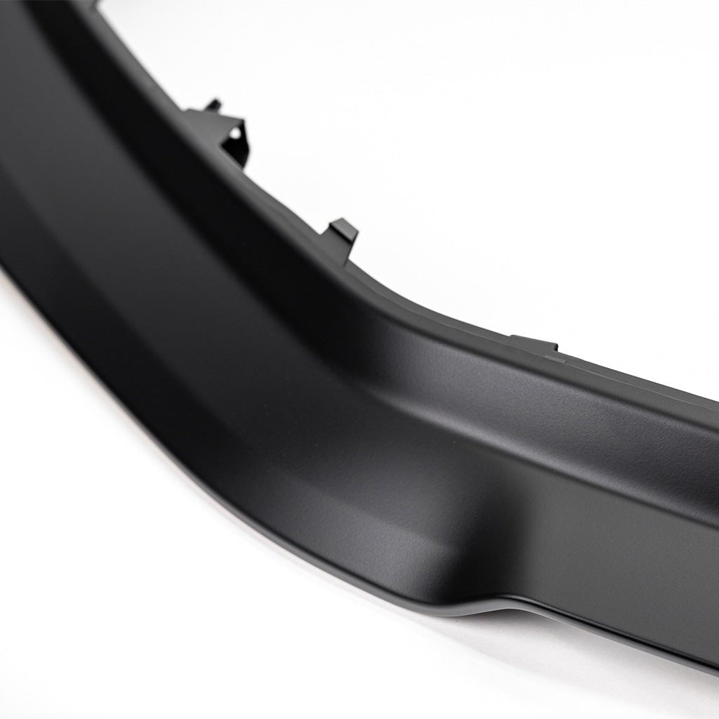 Sleek detail photo of RTR Chin Splitter for 2024+ Mustang EcoBoost and GT models. Modern design in durable black ASA plastic, with optional Undertray Extension for enhanced airflow. Easy installation with no permanent modification required.