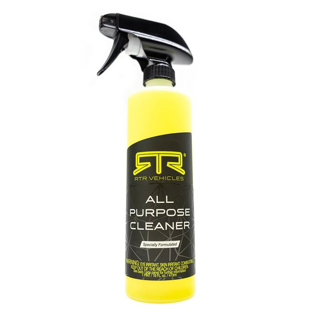 A close-up of RTR All Purpose Cleaner: a clear spray bottle with black label