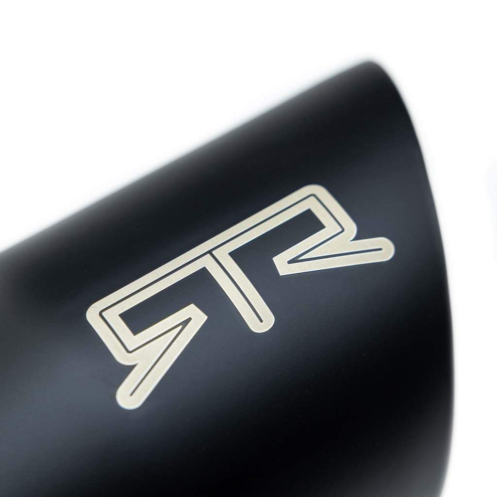 Close-up of RTR 4” Exhaust Tip for 2021+ F-150, showcasing sleek design and easy clamp-on installation. Elevate your truck's look effortlessly with this rugged and durable upgrade.